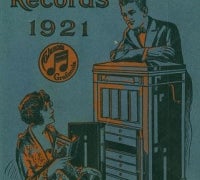 Image of man and woman listening to a phonograph. Cover of the 1921 Columbia Records catalog. Title text reads: Columbia Records 1921.